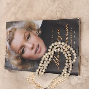 Three string pearl necklace